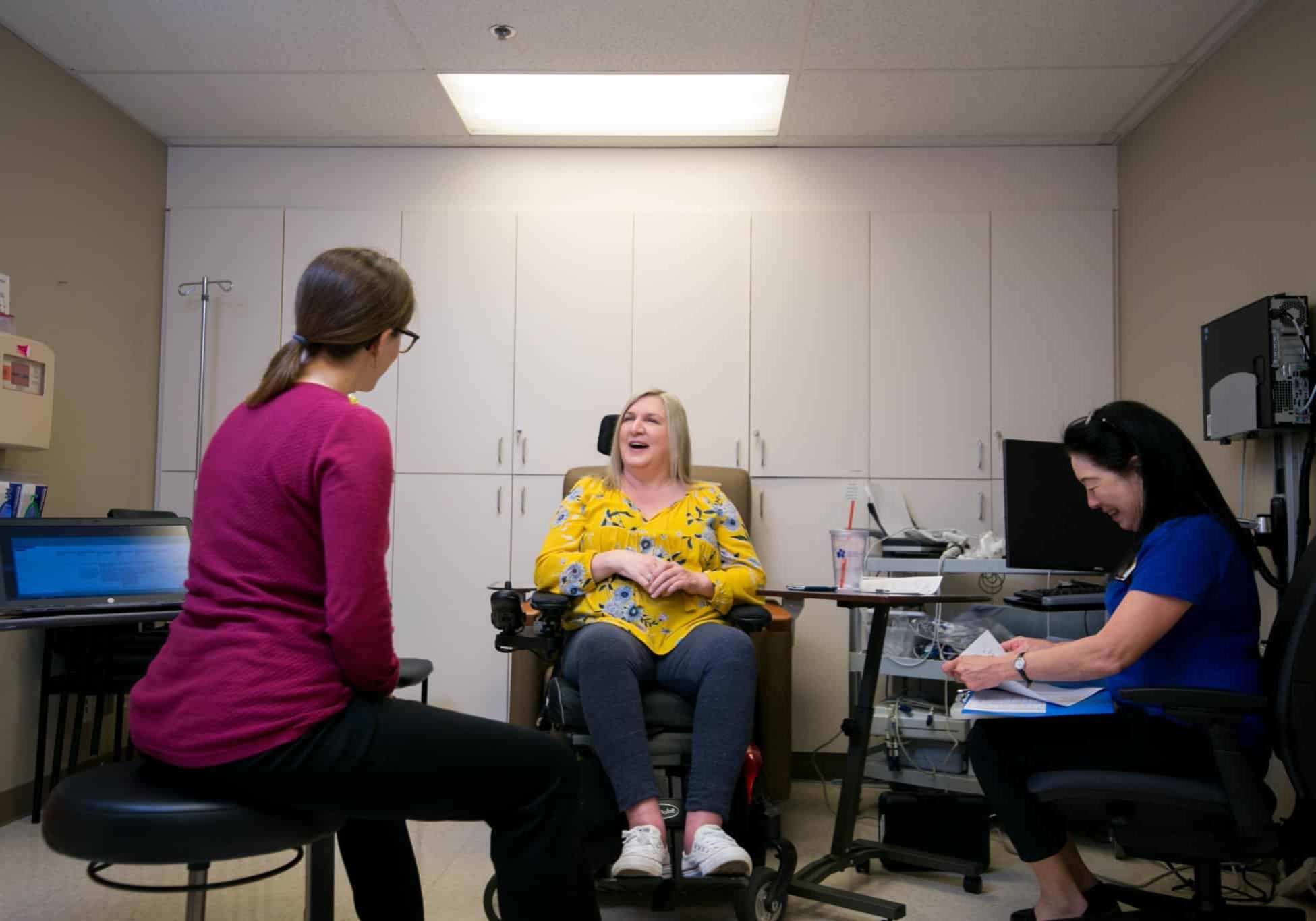 A person living with ALS at the doctor's office