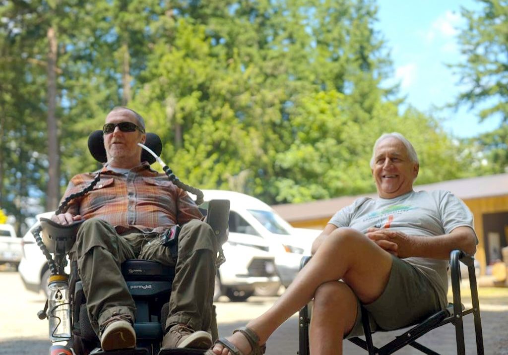 Two people living well with ALS.